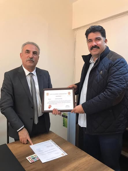 Hamit Yıldırım’a yeni görev yerinde hayırlı olsun ziyareti ve Mazbata takdimi.